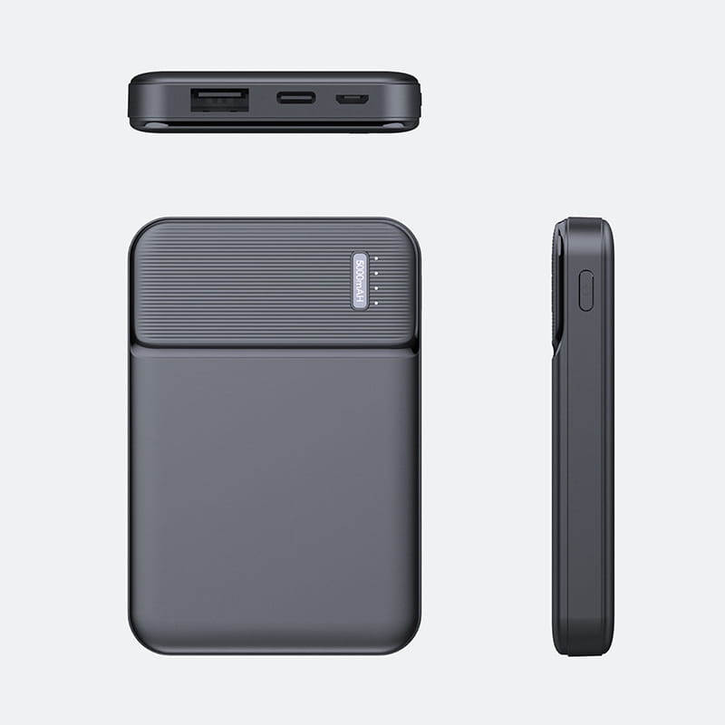 Black rectangular 5000mAh portable power bank with a textured top panel and smooth sides showing multiple USB ports on the back side.