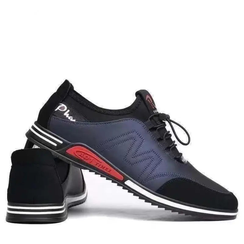 Men casual leather sneakers in black and navy blue with red accent and white stripes along the sole, lightweight and non slip for everyday use.