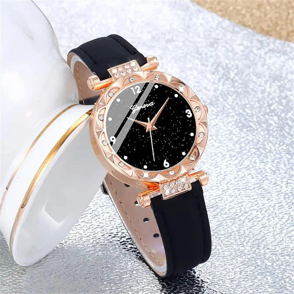 Black leather women quartz watch set featuring a rose gold-toned case with a black starry dial and crystal accents, paired with a sleek black leather strap.