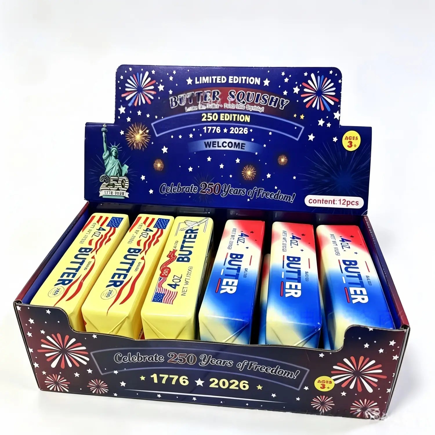 Barre de jouet antistress souple à la forme de beurre à la fraise à montée lente, en édition limitée bleu et jaune, dans une boîte de présentation festive fabriquée en mousse souple à montée lente.