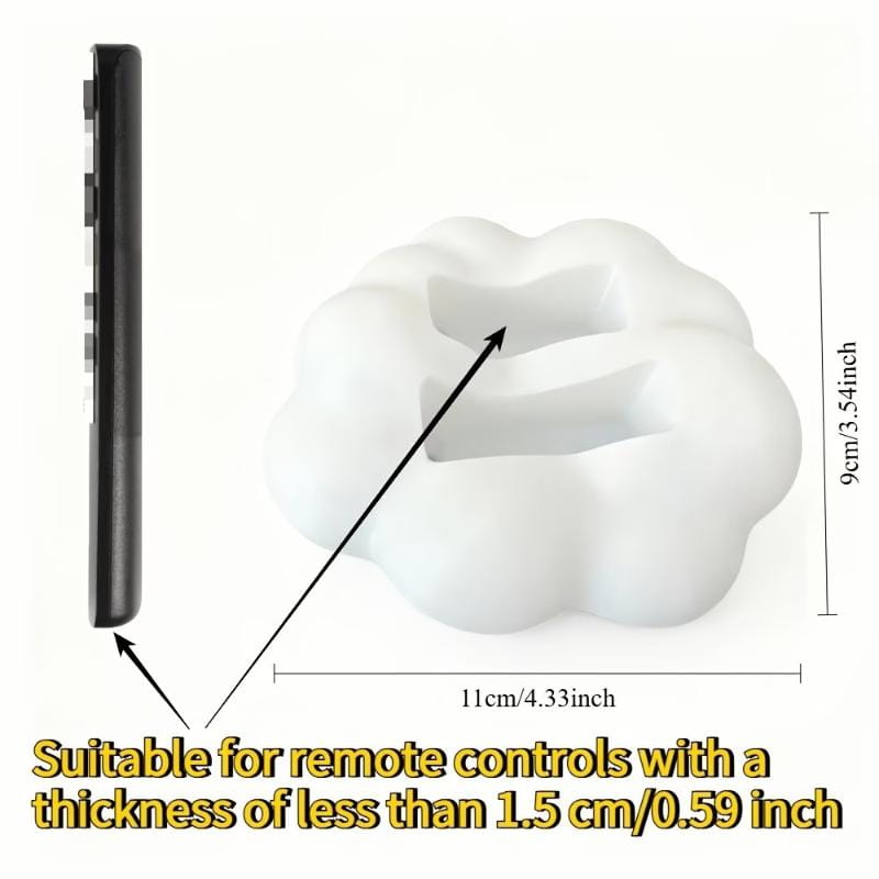 White cloud-shaped silicone remote control holder with a central slot for securing devices designed as a remote control holder for living rooms.