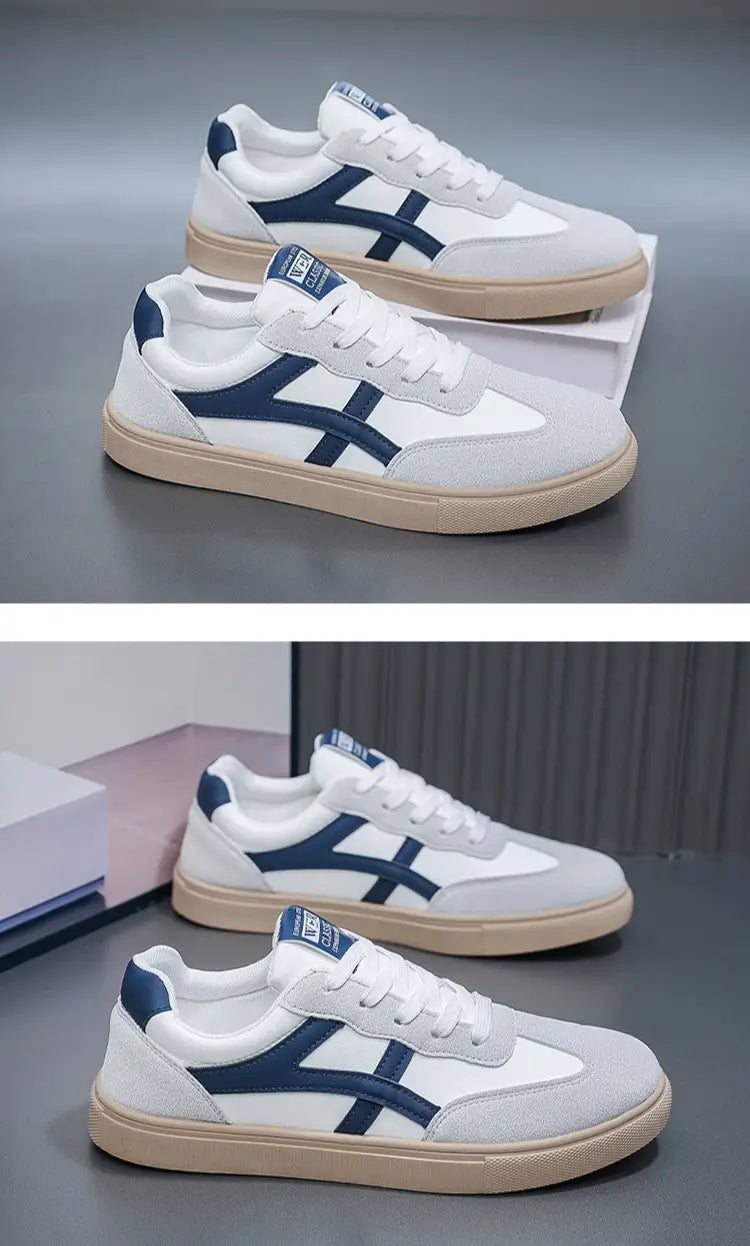 Sneakers décontractées pour hommes, chaussures de marche légères, Onitsuka Tiger en blanc et bleu marine, avec dessus en daim, superpositions en toile et semelles extérieures en caoutchouc beige.