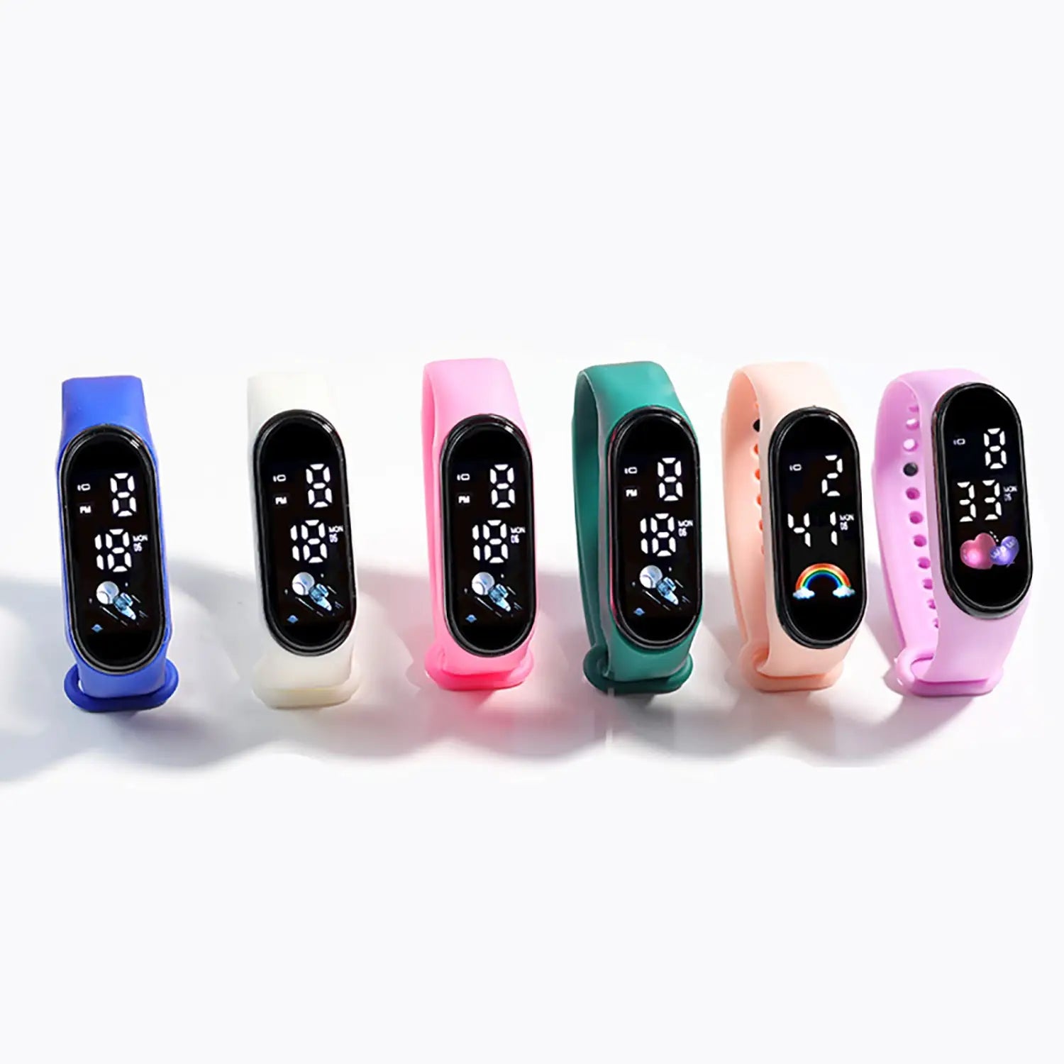 A row of colorful silicone-wrapped kids digital LED sports watches with black rectangular screens displaying time and date featuring a playful rainbow design on one.