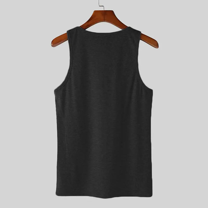Black ribbed knit sleeveless men solid color casual tank top hanging on a wooden hanger.