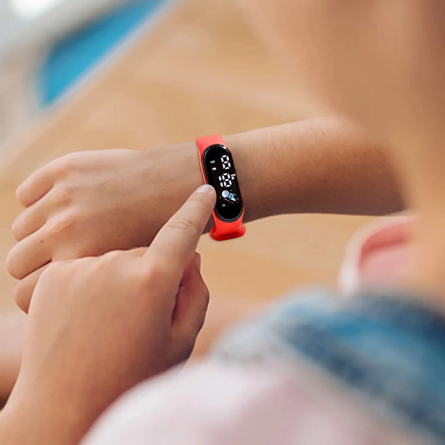 vibrant red silicone band kids digital led silicone sports watch with black display screen showing time and steps for fitness tracking