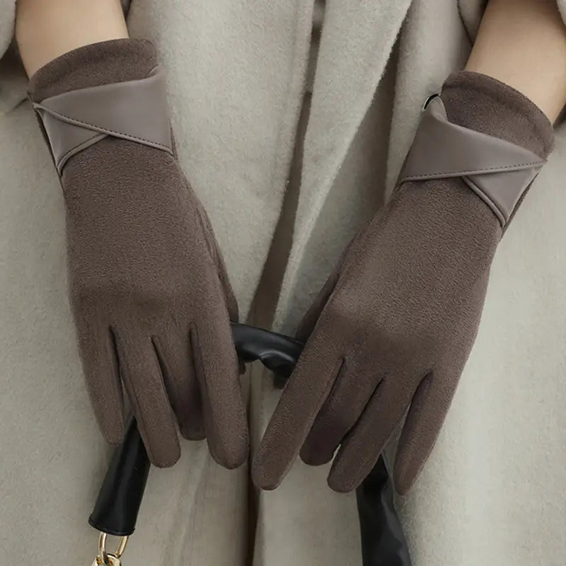 brown suede women’s touchscreen winter gloves showing the back side with a contrasting gray leather strap across the wrist