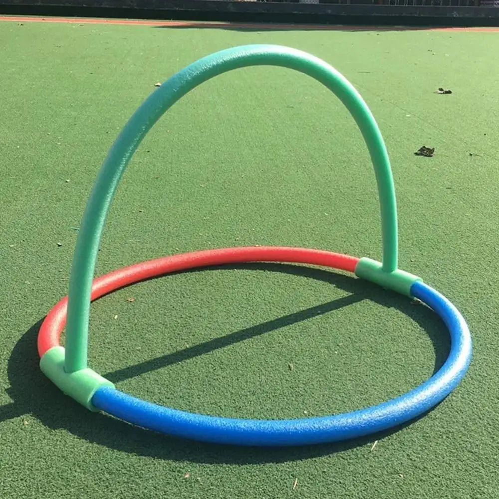 Pool noodle connector training aid float holder featuring a colorful three-part foam hoop set with a green arch and red and blue circular base.