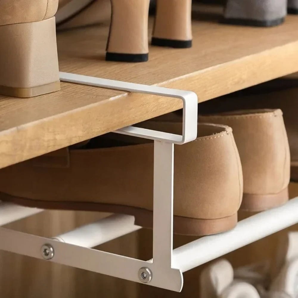 white metal telescopic shoe rack with minimalist design for efficient shoe storage and organization
