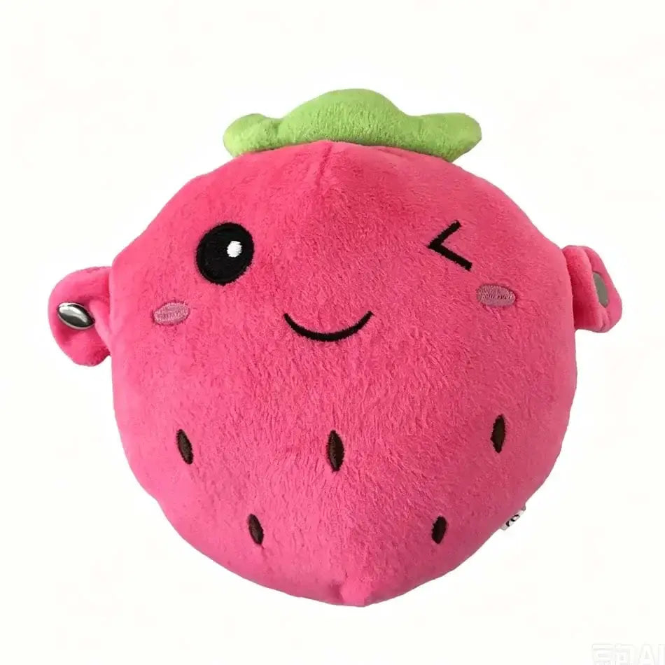 A plush pink strawberry-shaped coin purse with a green leafy top, embroidered black eyes and smile, small brown seed details, and stuffed animal toy texture.