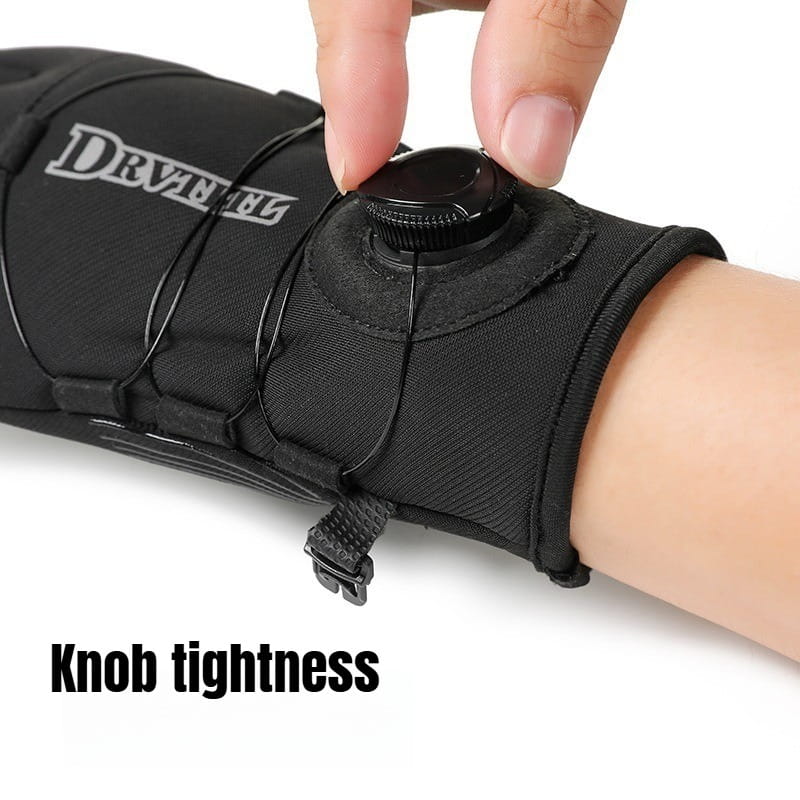 Serre-poignet en tissu noir avec bouton réglable et marquage Dryvent sur des lanières élastiques, assurant un ajustement serré pour des gants thermiques coupe-vent.