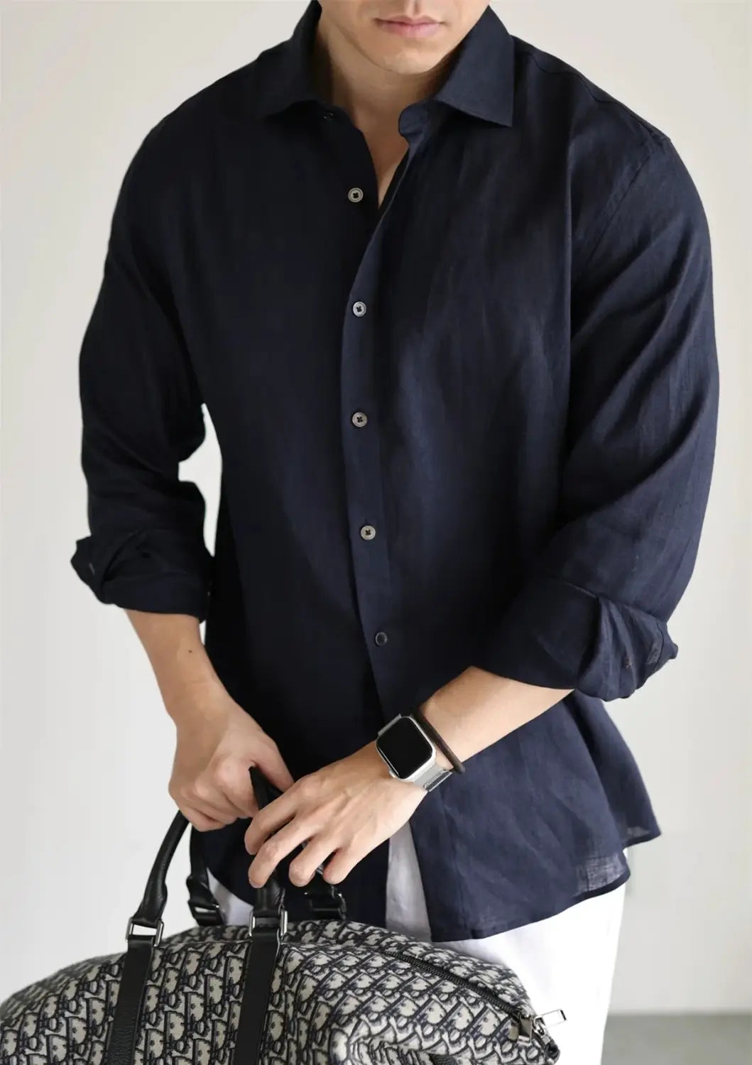 Navy blue men cotton linen casual button-down shirt with rolled-up sleeves and silver buttons.