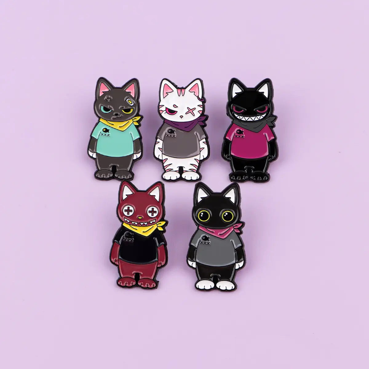 Five colorful enamel cat lapel pins featuring unique expressions and outfits in a cat enamel lapel pin set.