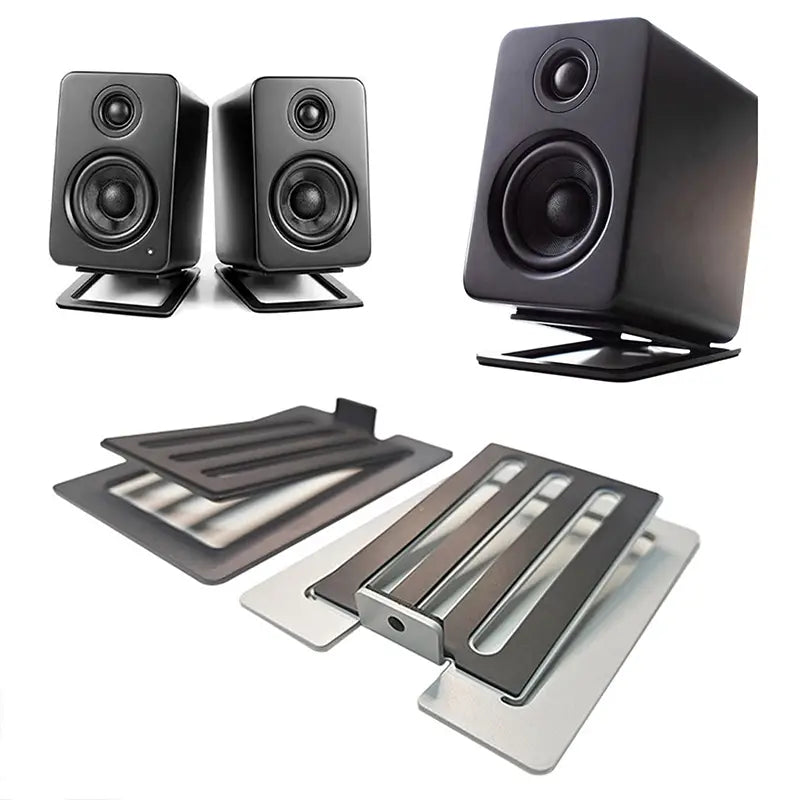 black rectangular studio monitors with matte finish and dual-driver design shown on adjustable aluminum desktop speaker stands with 16 degree tilt and matching metal stand accessories