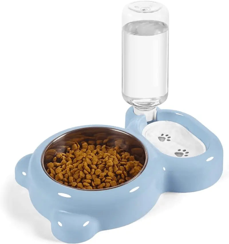 Juego de comedero y bebedero para mascotas con forma de oso color azul claro, con un cuenco de comida de acero inoxidable y una botella de agua transparente en la parte superior.
