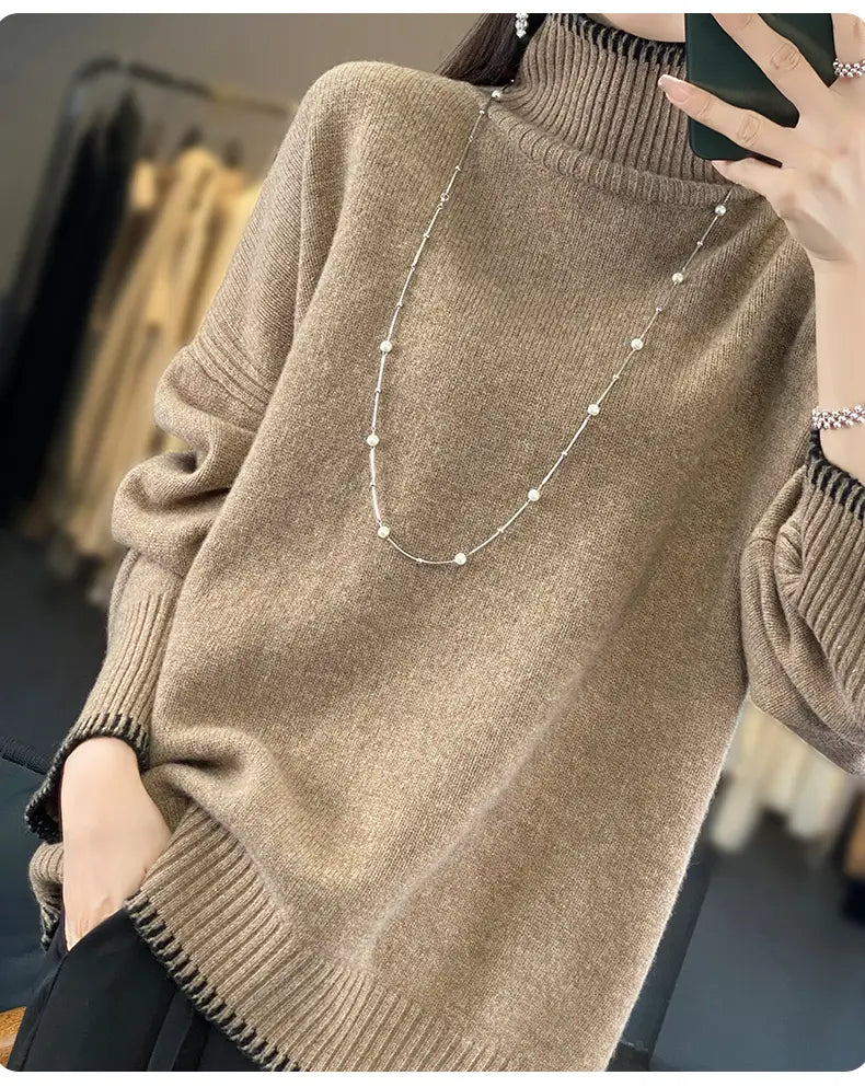 A cozy beige pure wool turtleneck sweater for women featuring ribbed cuffs and hem.