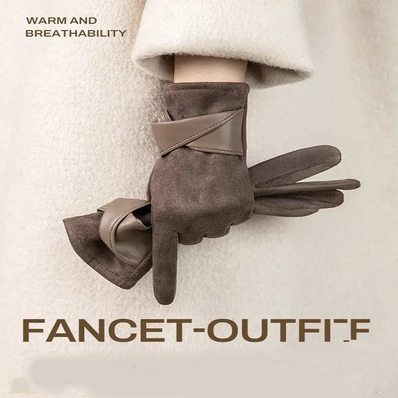 brown suede and leather women’s touchscreen winter gloves featuring a thermal lining and a cross-belt design on the wrist shown from the back side