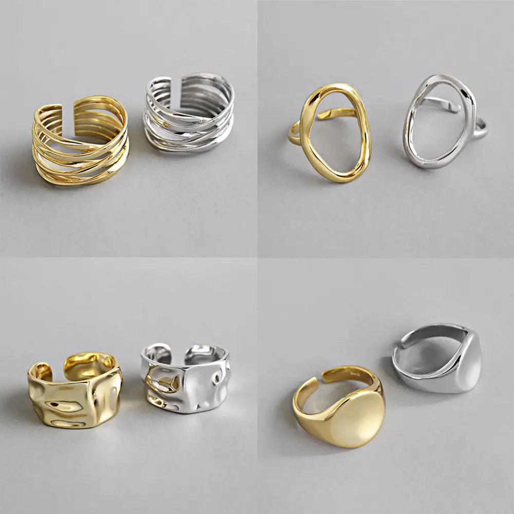 Sterling silver open ring for women featuring gold and silver open-ended rings with textured layered and smooth designs.