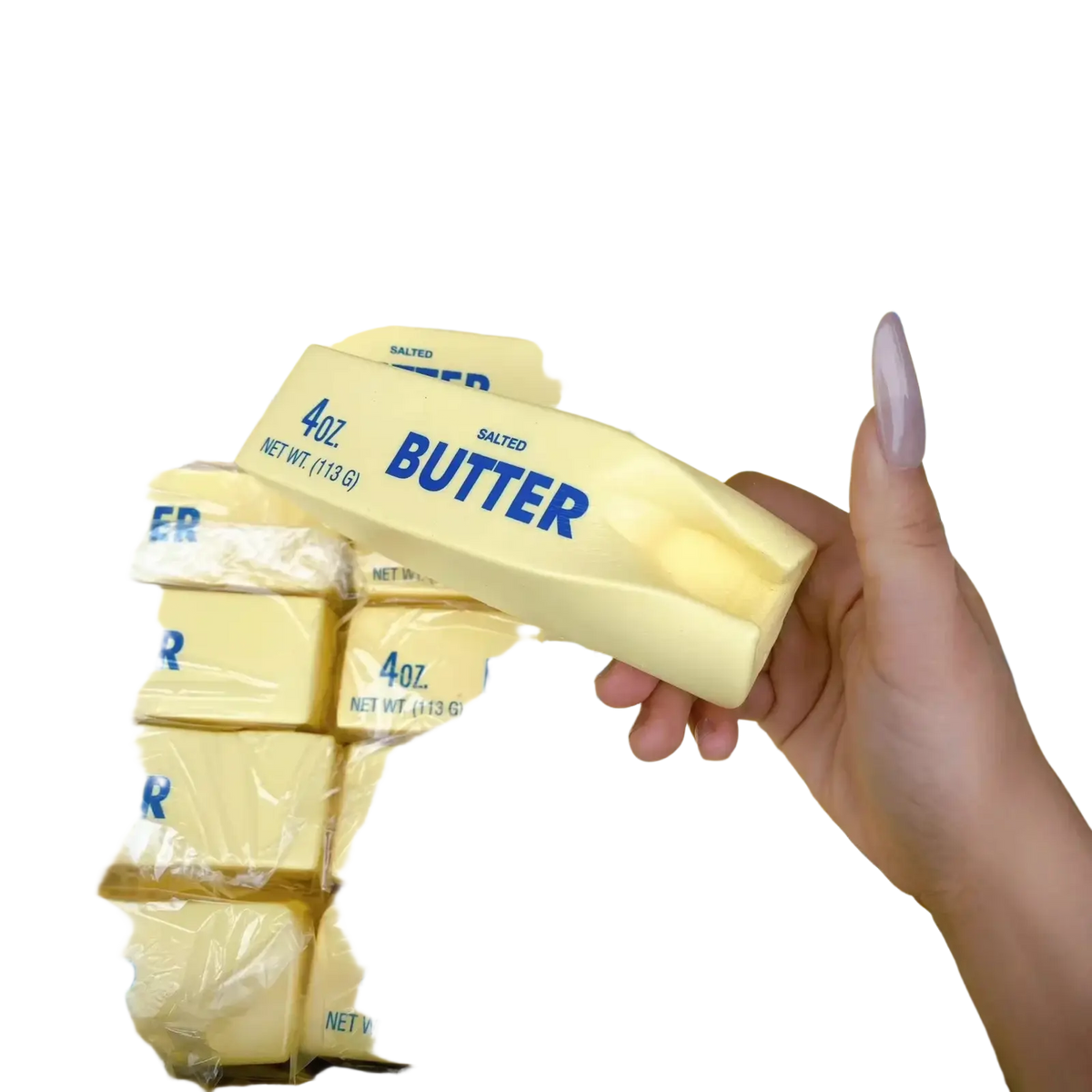 A hand holds a 4oz salted butter bar slow rising squishy toy in pale yellow soft material for stress relief