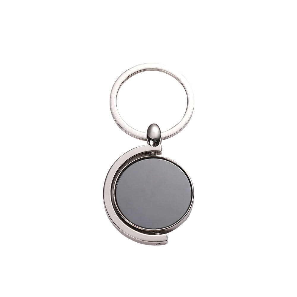 Silver-toned rotating silver circle keychain featuring a circular rotating magnetic disc as a gift accessory.