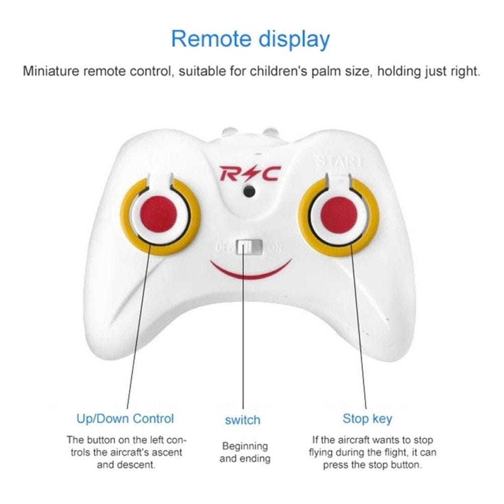 Marca rrc blanca de control remoto en miniatura con botones circulares rojos y amarillos, un diseño de rostro sonriente y un interruptor de encendido y apagado para el juguete de helicóptero de inducción en suspensión teledirigido.