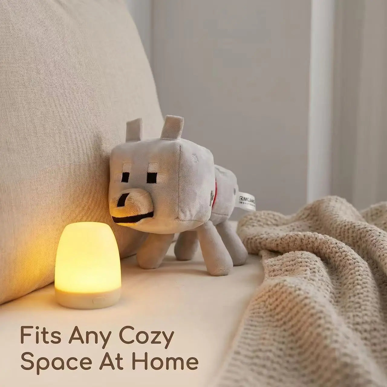 A soft light gray plush Minecraft wolf plush with blocky features and a black nose measuring 20cm.