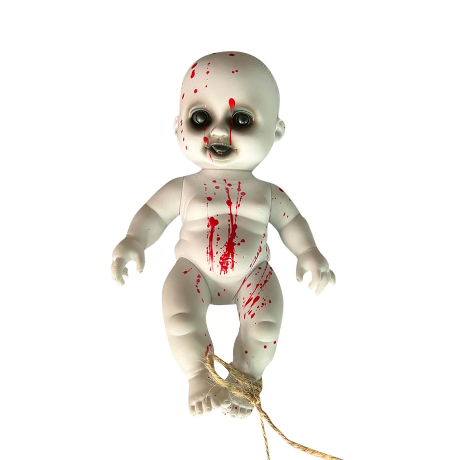 white plastic horror doll with red splatter paint and black eyes tied at the feet hanging as a spooky halloween ghost prop