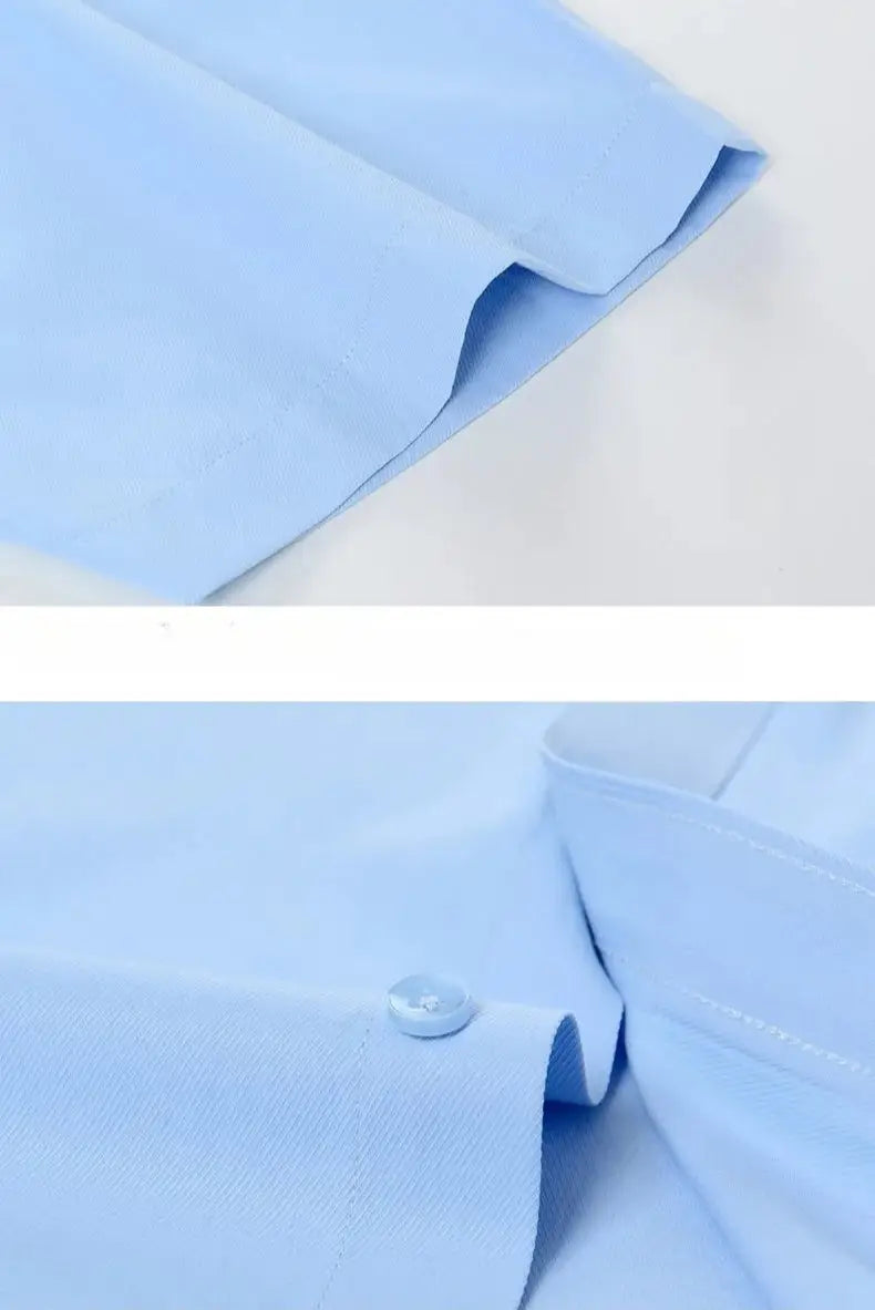 Light blue cotton men long sleeve dress shirt with crisp collar and subtle stitching for formal office wear featuring anti wrinkle fabric.