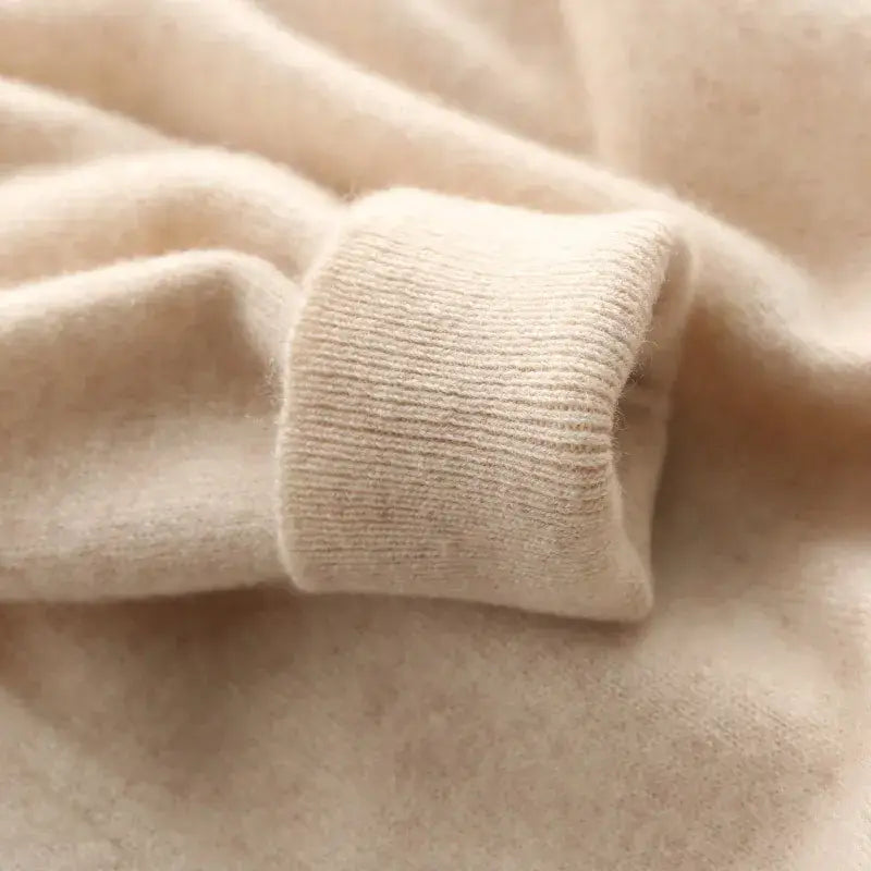 Cream-colored men cashmere v neck pullover sweater featuring a soft-knit cuff with a ribbed texture.