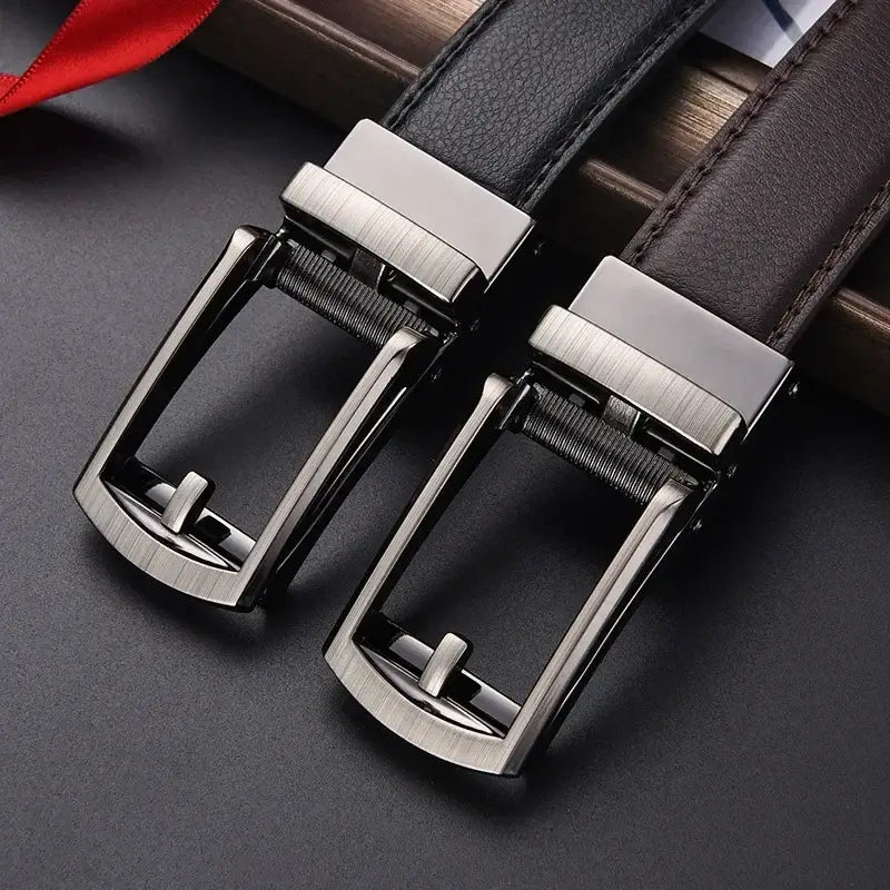 Two sleek brushed silver-tone automatic belt buckles with black leather straps for mens automatic leather belt silver buckle.