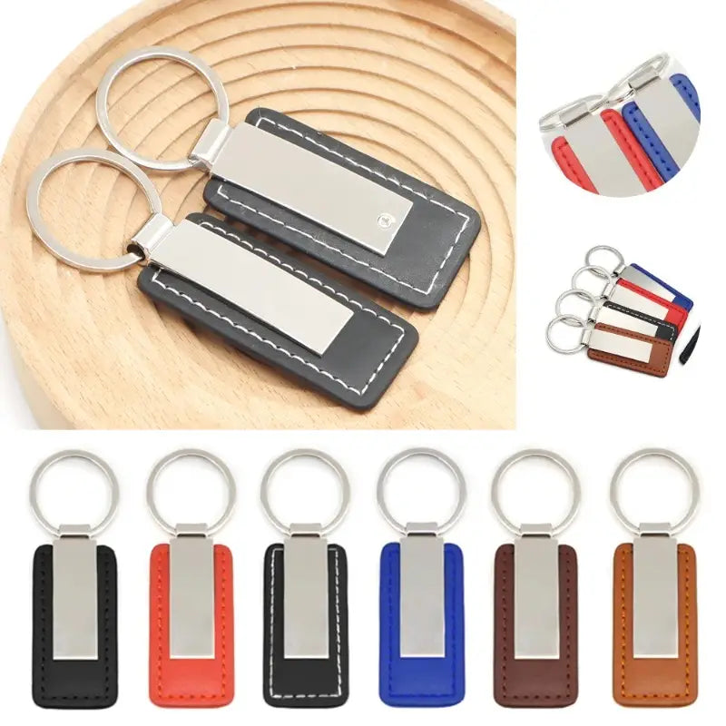 Black leather custom couple keychain with silver metal plate and white stitching designed as a personalized matching gift.
