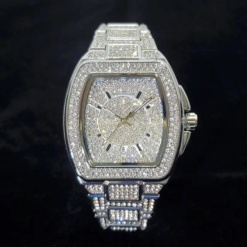A dazzling silver gold iced out square diamond mens watch with a quartz movement and a bracelet fully encrusted in sparkling clear crystals.