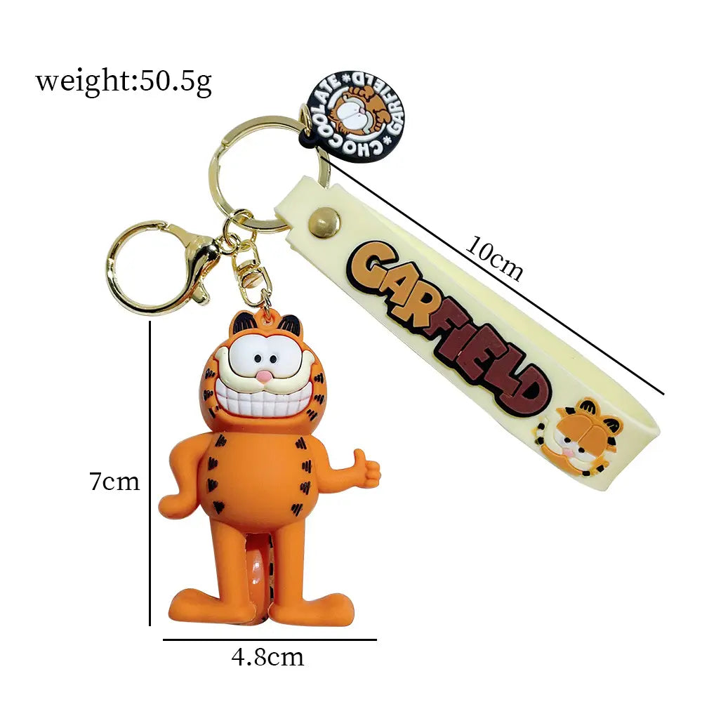 orange garfield rubber keychain figurine with black heart-shaped spots smiling face and thumbs-up gesture from the garfield keychain rubber anime cat key pendant collection.