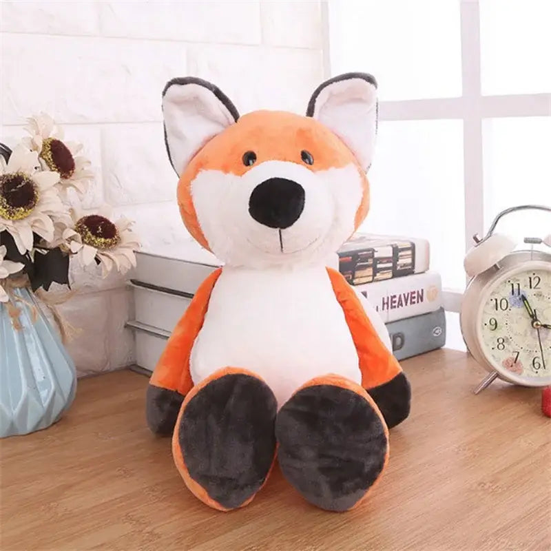 orange and white plush fox stuffed toy with black accents on ears nose paws and tail featured in lion elephant tiger plush stuffed animal toy product showcasing a tiger dog fox design