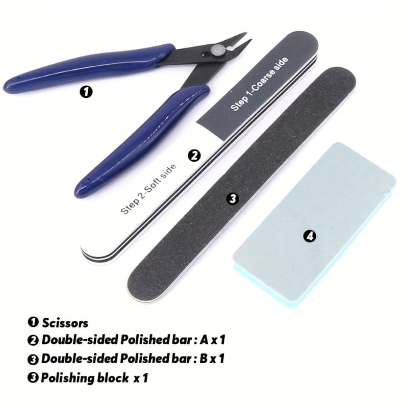 blue-handled nail scissors with black metal blades from model tool set for hobby craft assembly.