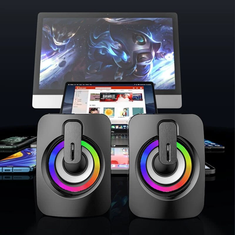 Black rectangular usb computer speakers with circular rgb led lights and a central control knob for easy audio adjustment.