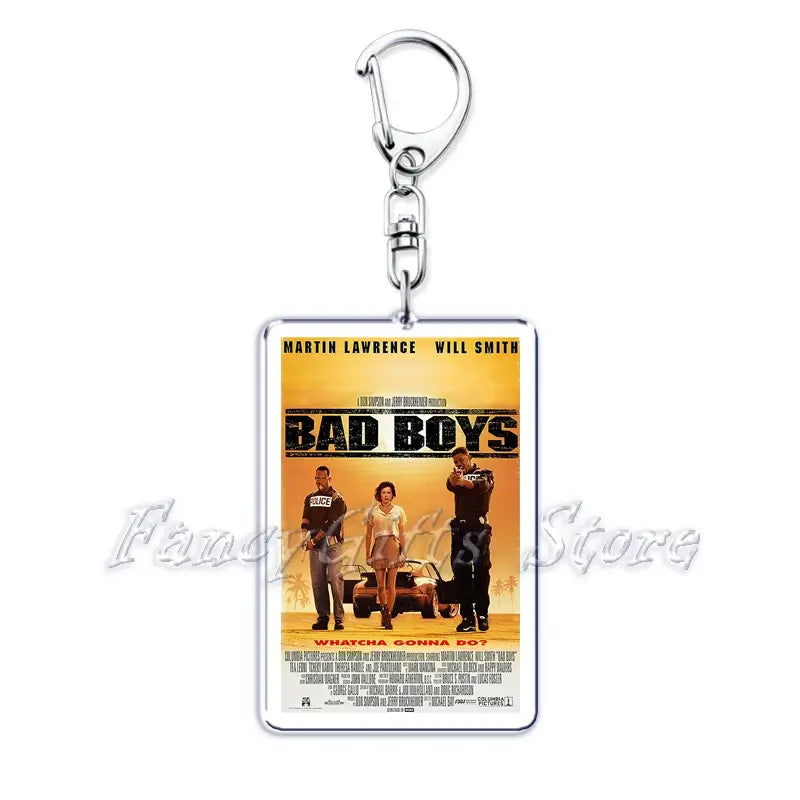 silver metal keychain featuring a rectangular acrylic charm with the bad boys movie poster by martin lawrence and will smith showcasing its iconic yellow orange background and characters in a movie poster acrylic keychain set.