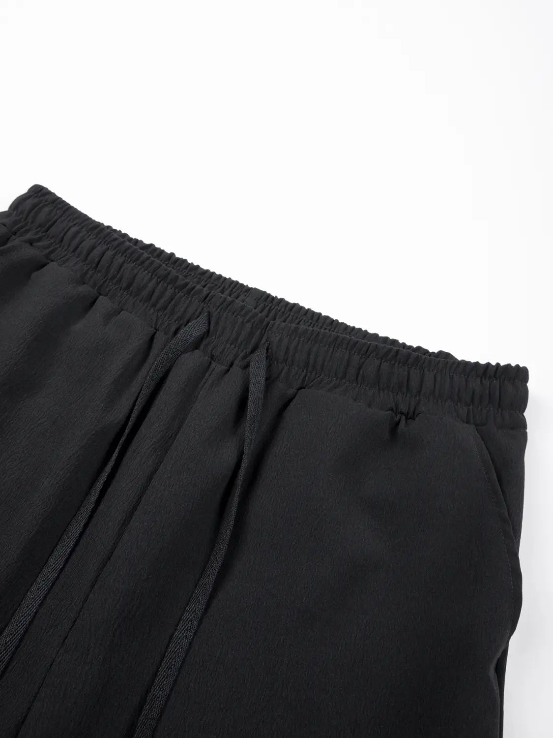 leichte Leinenjogginghosen für Herren in Schwarz mit elastischer Taille und passenden Kordelzügen