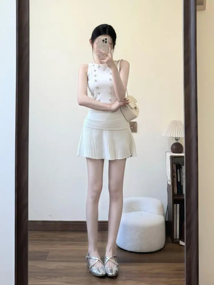Women Chic Two Piece Set Sleeveless Knit Tank Top and High Waist Pleated Mini Skirt Pearl Detail Slim Fit Suit Minimalist Outfit