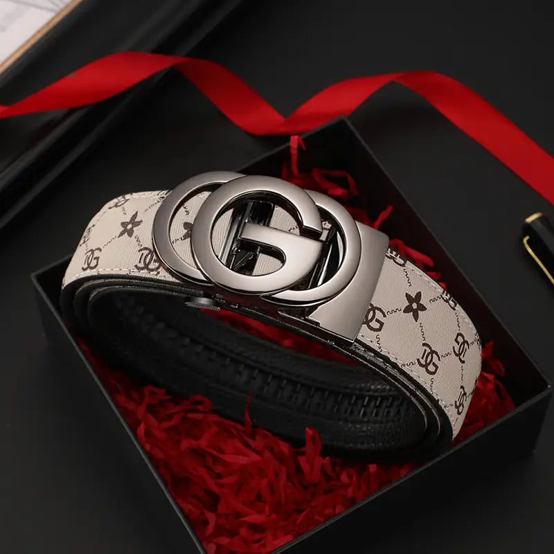 A cream-colored gucci men leather automatic buckle belt with black and beige pattern and polished silver double g logo buckle.