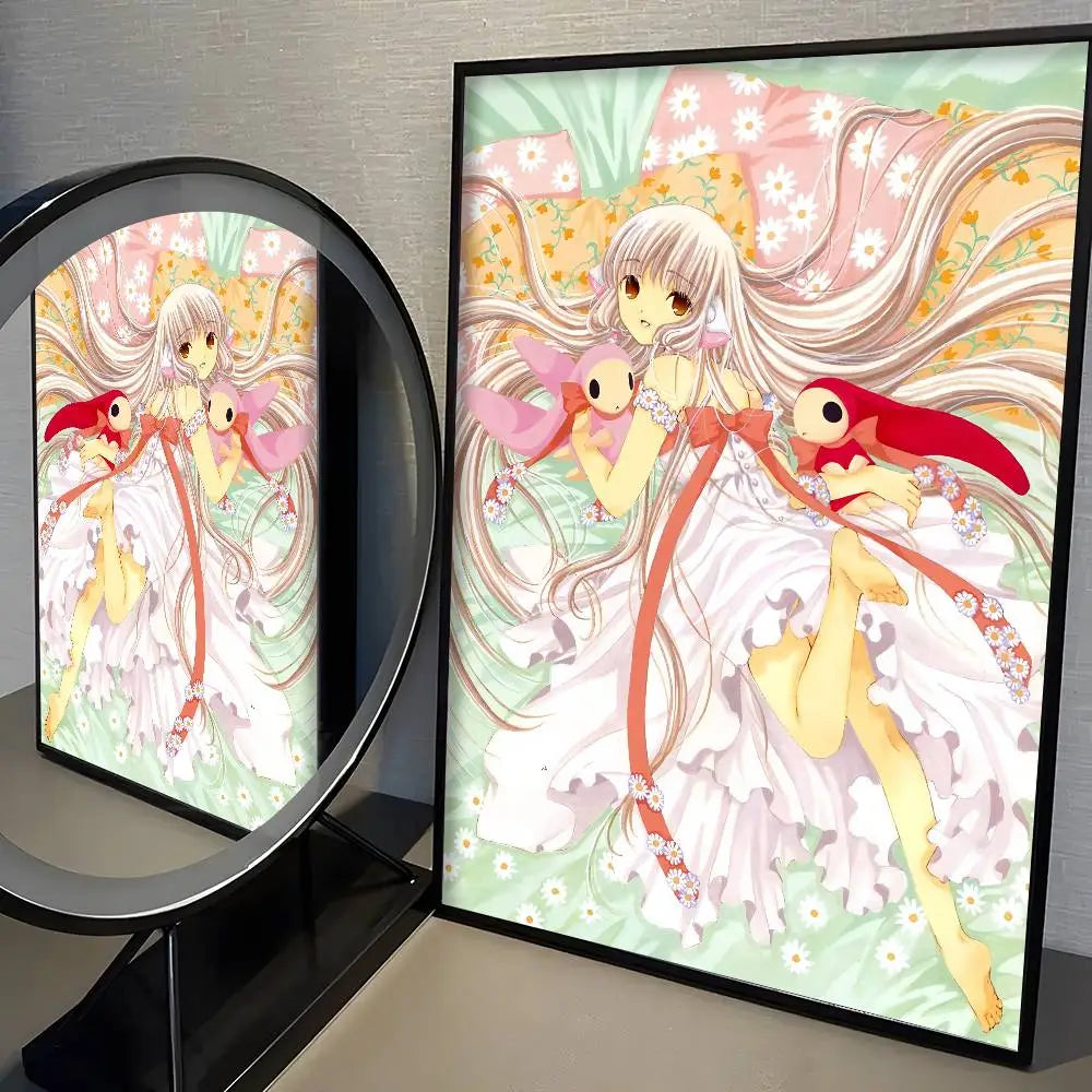 A framed kawaii girl cute anime wall art print poster featuring a girl with long flowing blonde hair in a white dress adorned with floral patterns and red ribbons.