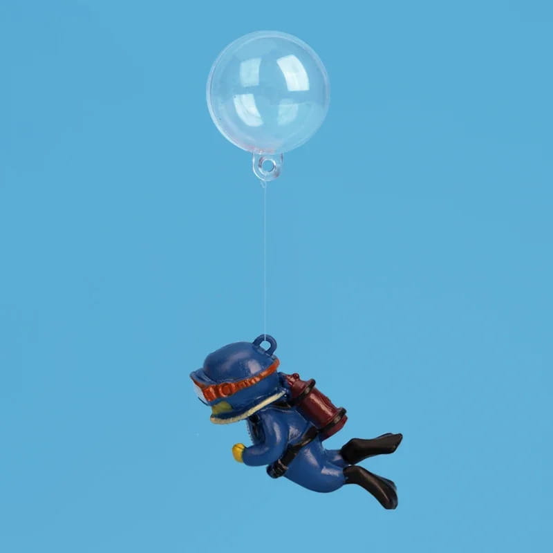 Blue plastic diver figurine with orange goggles and red tank floating on a clear balloon for popular aquarium decorations and fish tank landscape decor accessories.