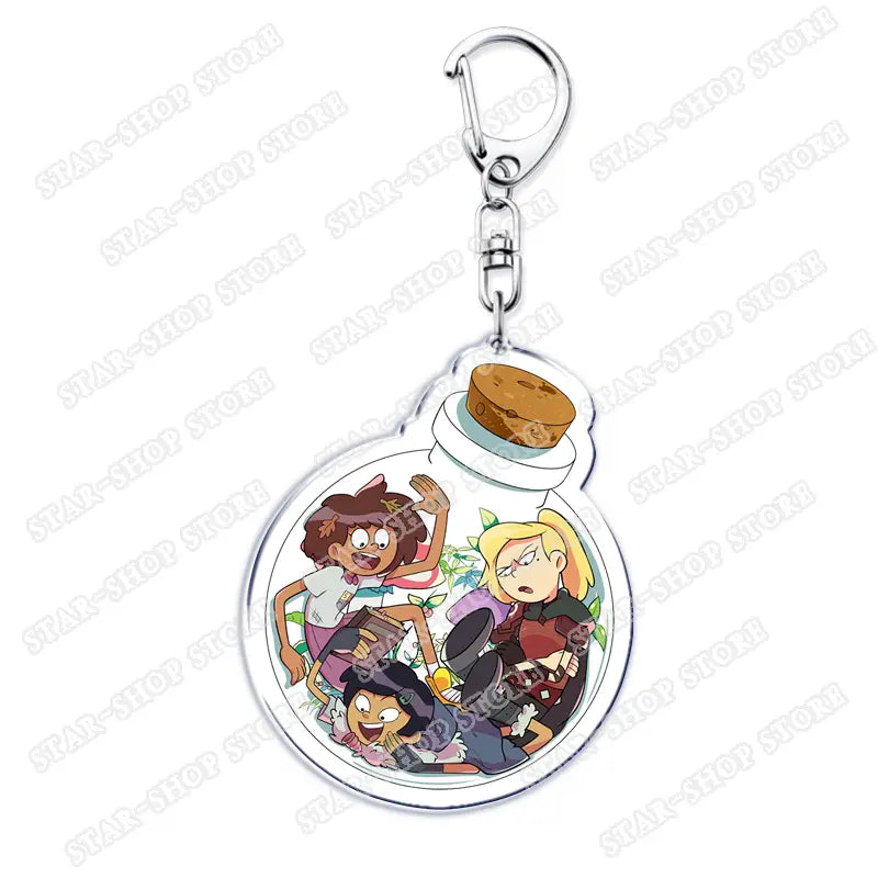 Clear acrylic Amphibia anime keychain shaped like a bottle with a cork stopper featuring colorful cartoon characters inside.