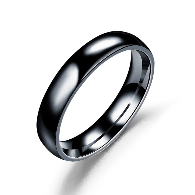 A sleek black tungsten carbide wedding band with a smooth polished finish and subtle inner bevel featured alongside a stainless steel 6mm rose gold wedding ring.