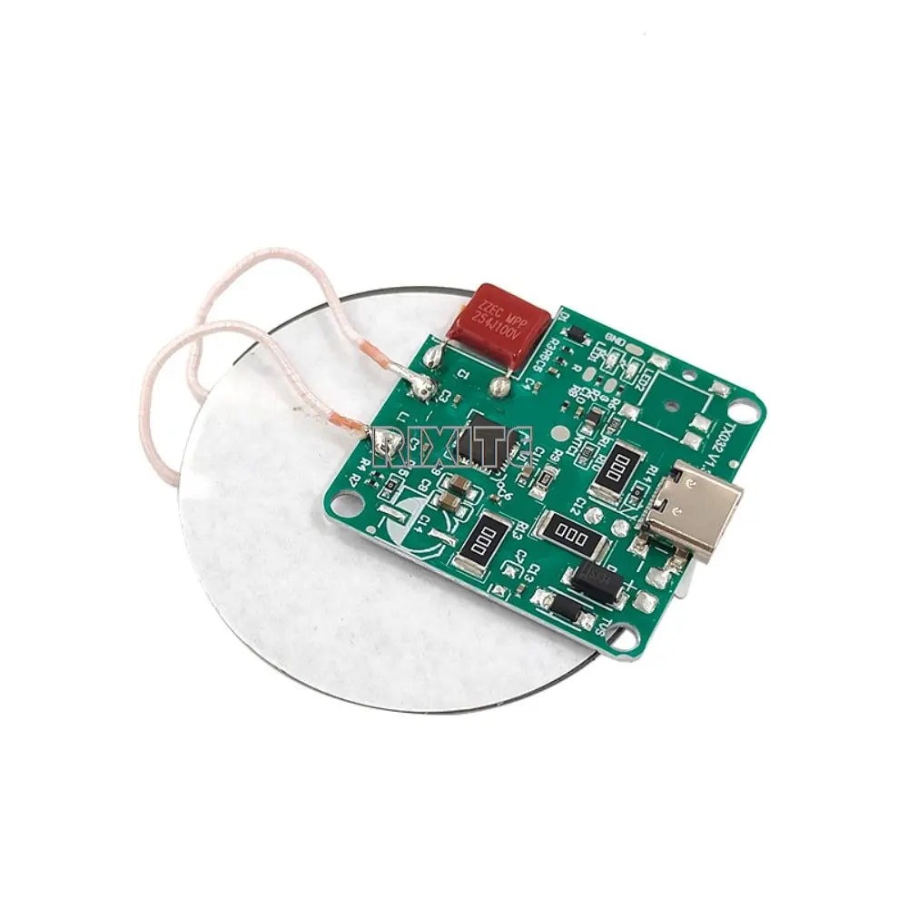 Green circuit board with usb port and various electronic components for a wireless charger 15w fast charging type c module with 12v input.