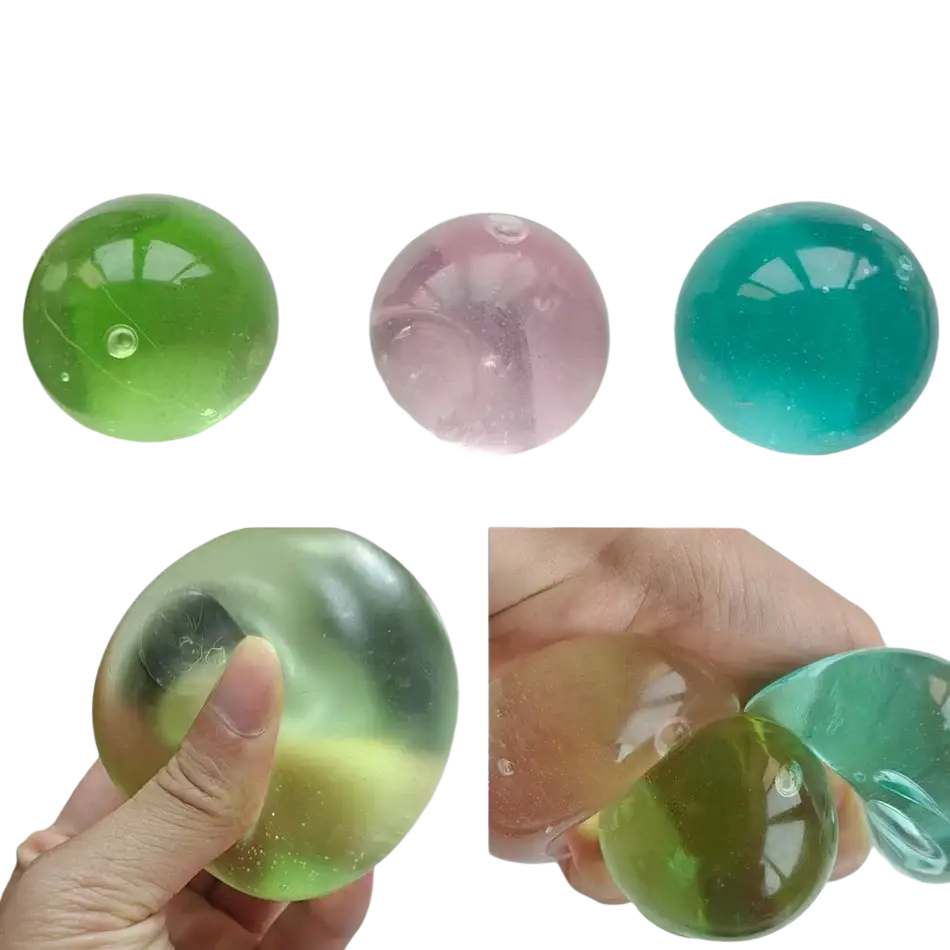 Clear translucent pink green and teal squishy stress balls with glossy finish slow rebound sensory fidget toys