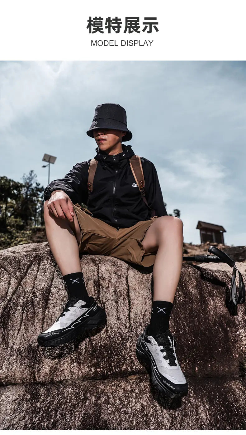 black and white waterproof lightweight men hiking shoes with rugged layered design for trekking and outdoor activities