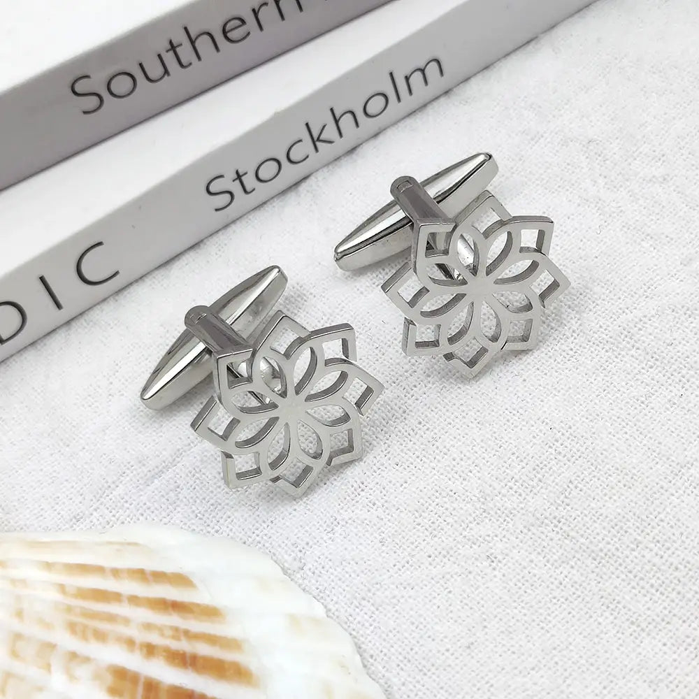 Stainless steel floral cufflinks for men featuring a silver-toned, intricately cut floral pattern with a polished metallic finish.