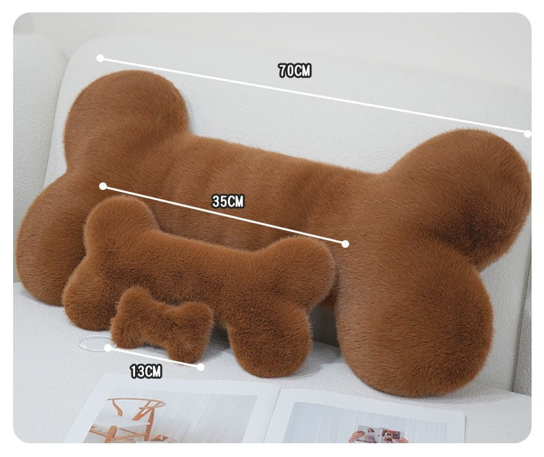 brown kawaii bone shape plush pillow with soft fuzzy texture designed as a nap cushion