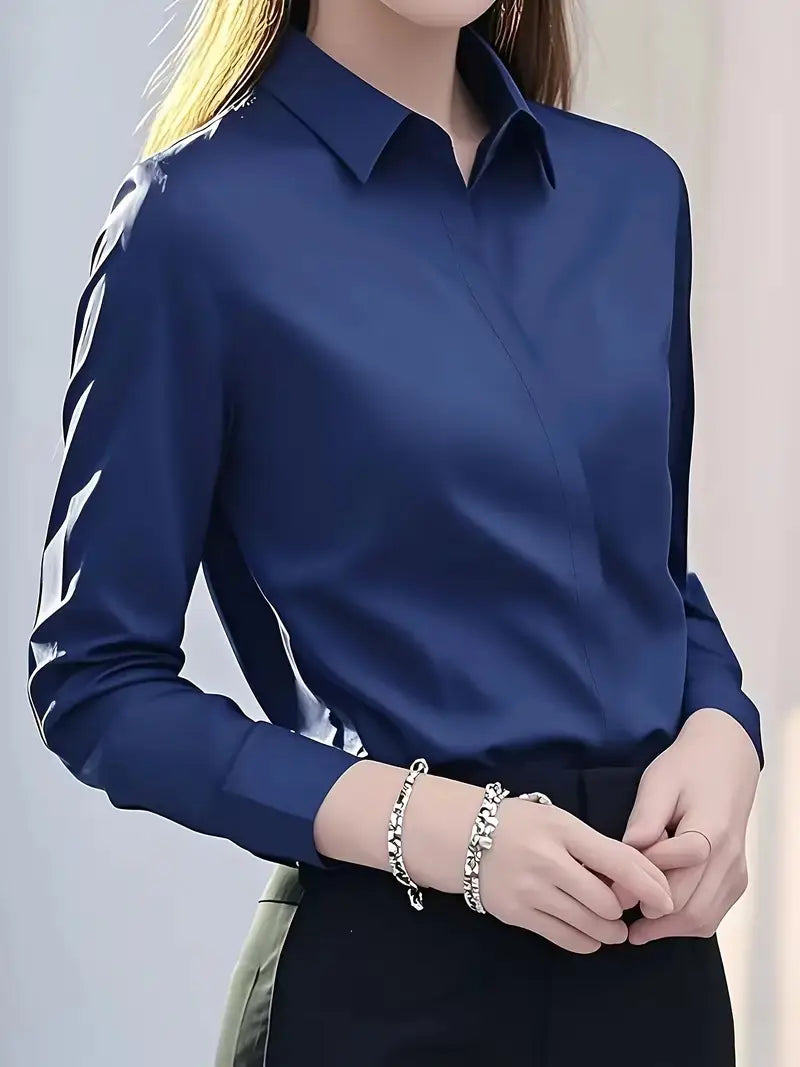 Deep navy fitted long sleeve silk blouse dress shirt featuring sleek long sleeves and a crisp collar.