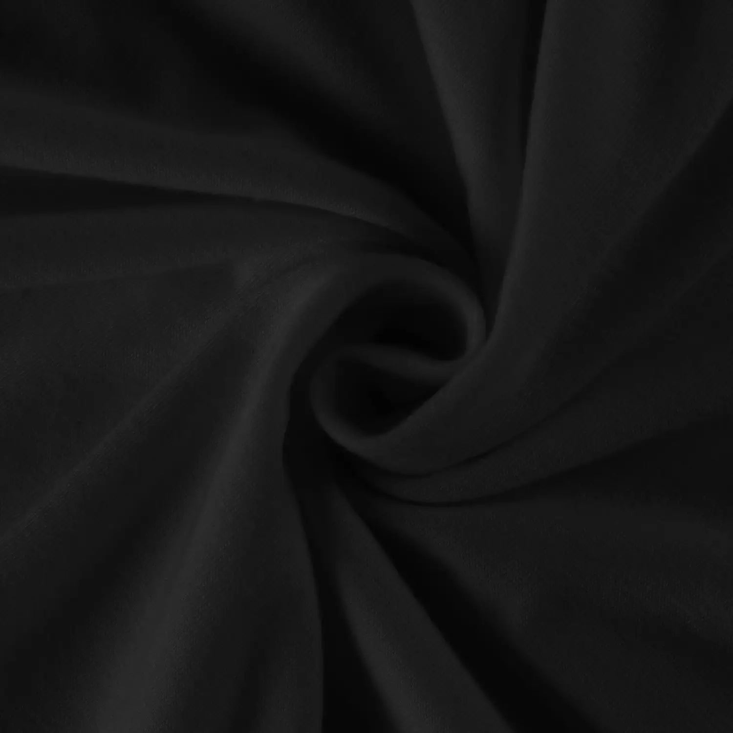 Black soft textured cotton fabric with a subtle sheen and gentle folds for a women long sleeve tunic top featuring round neck and plain pattern type.